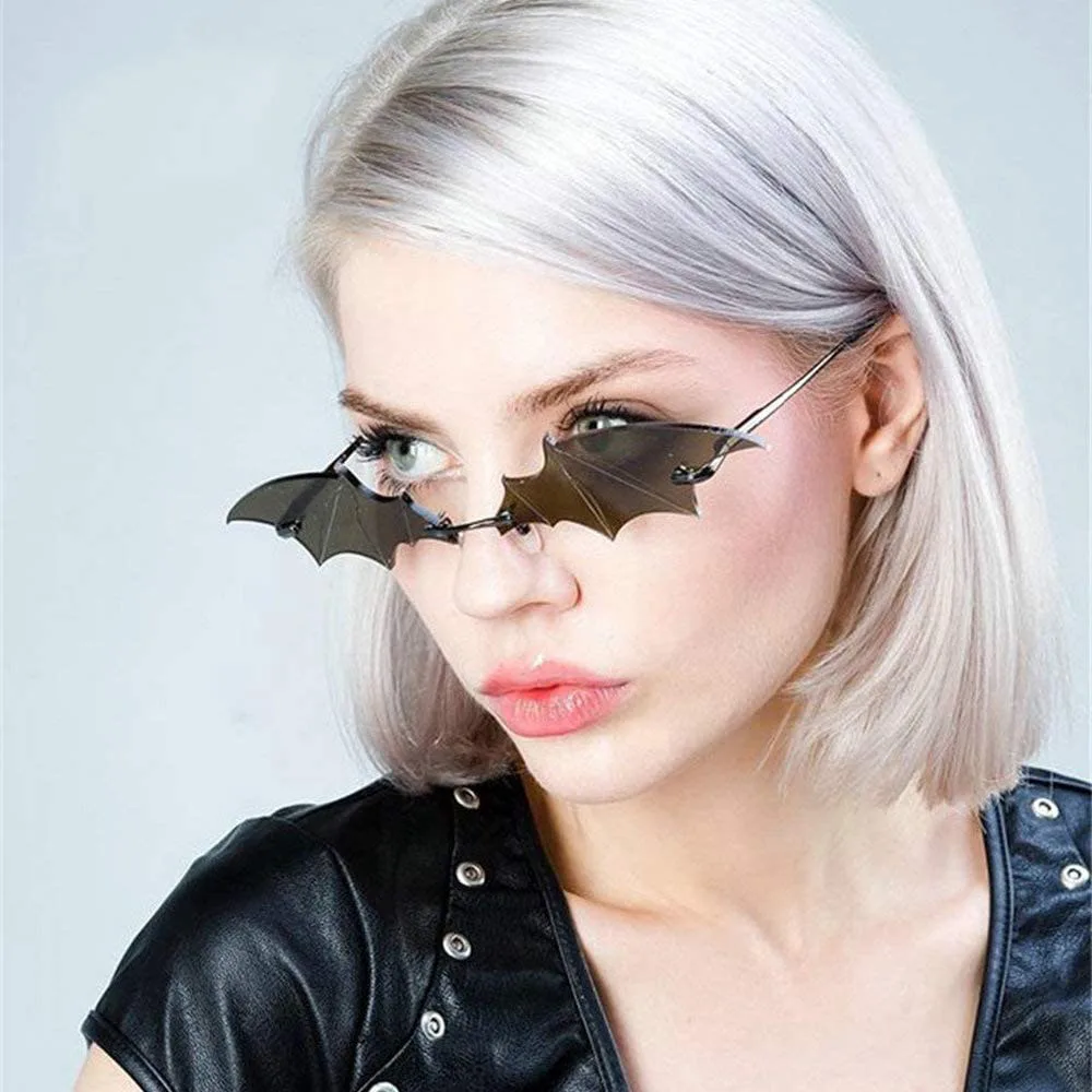 Personality Bat Sunglasses New Trendy Funny Vintage Rimless Frame Bat Wing Women Sunglasses UV400 
Personality Bat Sunglasses New Trendy Funny Vintage Rimless Frame Bat Wing Women Sunglasses UV400