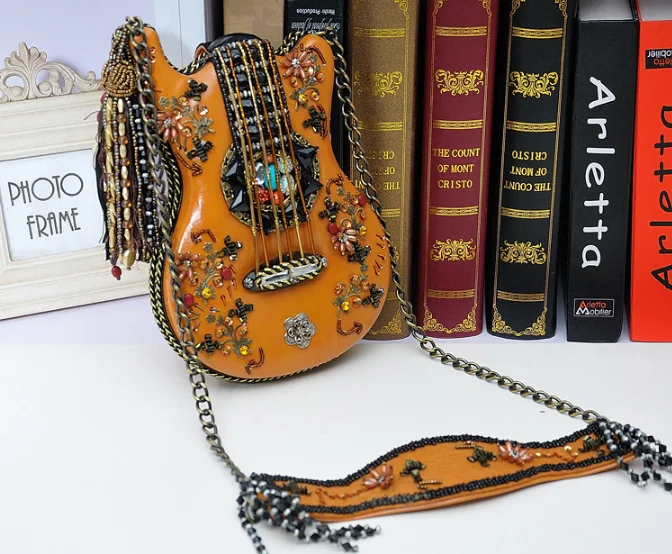 TLB-8C337 Ethnic Handmade Guitar Shape Chain Crossbody Shoulder Bag Withe Tassel Bead
TLB-8C337 Ethnic Handmade Guitar Shape Chain Crossbody Shoulder Bag Withe Tassel Bead
