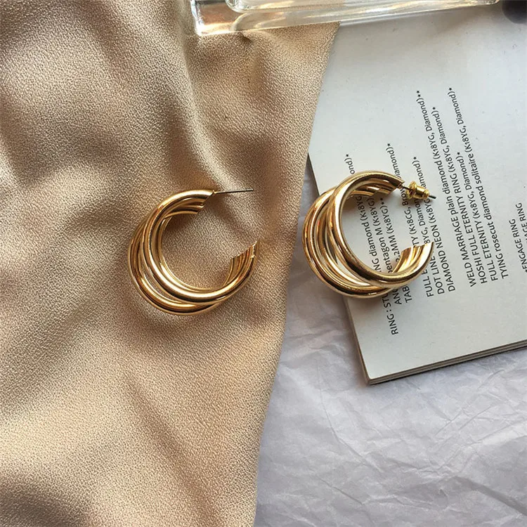 Custom designer inspired real gold plated brass three-layer metal hoop abstract earrings
Custom designer inspired real gold plated brass three-layer metal hoop abstract earrings