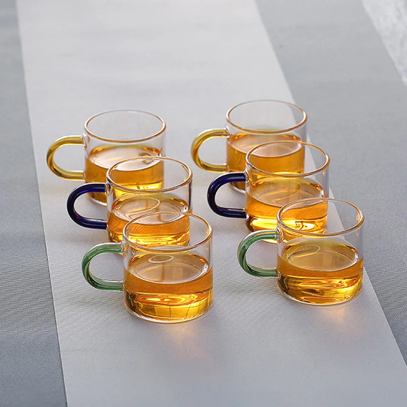 90ml 6 Pcs One Set Wholesale Modern Style Simple Reusable Round Shaped Shot Long Clear Tea Sets Of Glass Cups, Transparent cup with colorful handle
90ml 6 Pcs One Set Wholesale Modern Style Simple Reusable Round Shaped Shot Long Clear Tea Sets Of Glass Cups, Transparent cup with colorful handle