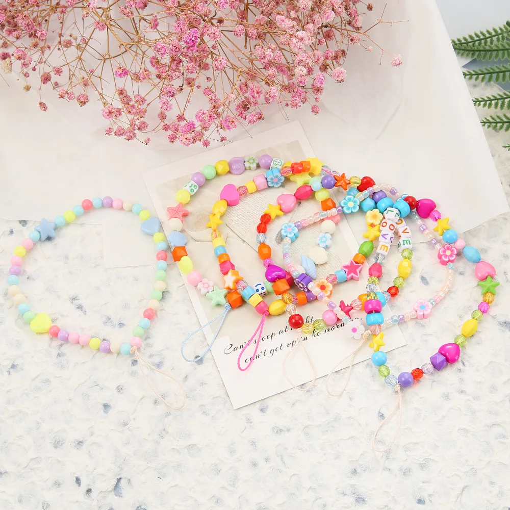 Hot sale Bohemia Ethnic Colorful Beads Shell Acrylic Letter Phone Strap Clay Flower Anti-lost Phone Chain Jewelry
Hot sale Bohemia Ethnic Colorful Beads Shell Acrylic Letter Phone Strap Clay Flower Anti-lost Phone Chain Jewelry
