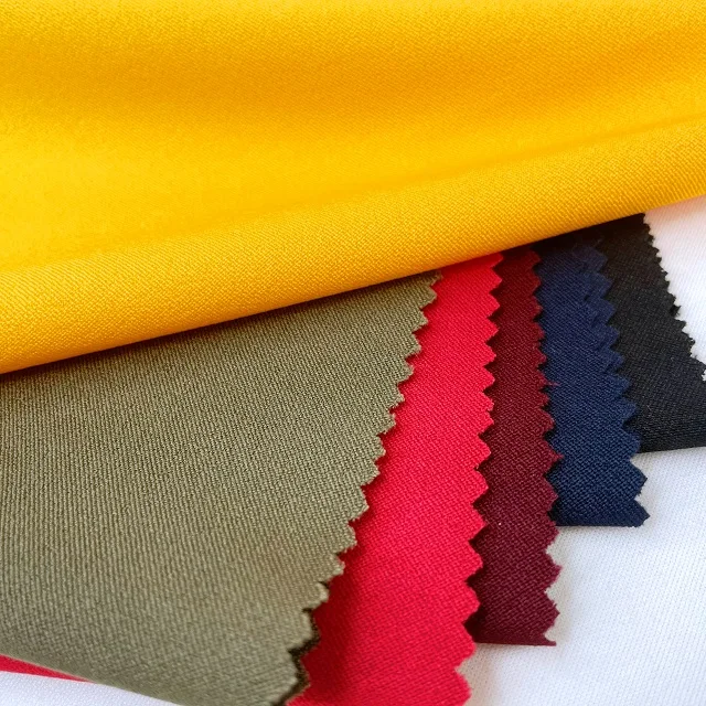 2021 Textile Fabric Customized Solid Twill polyester elastic Bengaline Woven trouser fabric for women leggings
2021 Textile Fabric Customized Solid Twill polyester elastic Bengaline Woven trouser fabric for women leggings