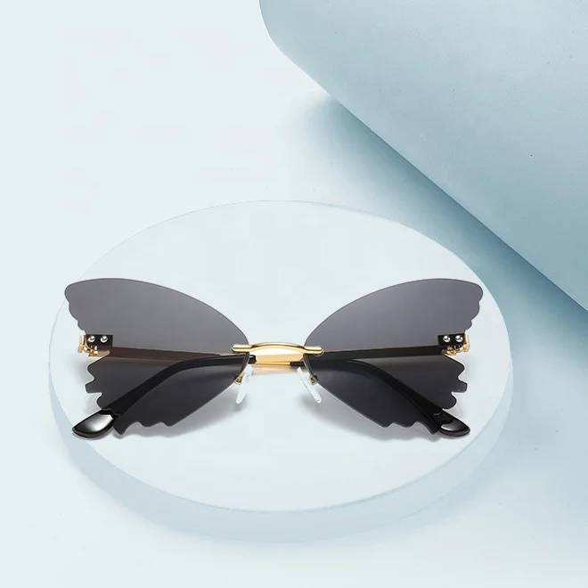 Wholesale Cheap Butterfly Rimless Female Shades Glasses Trendy Rimless Designer Women Sunglasses 2021
Wholesale Cheap Butterfly Rimless Female Shades Glasses Trendy Rimless Designer Women Sunglasses 2021