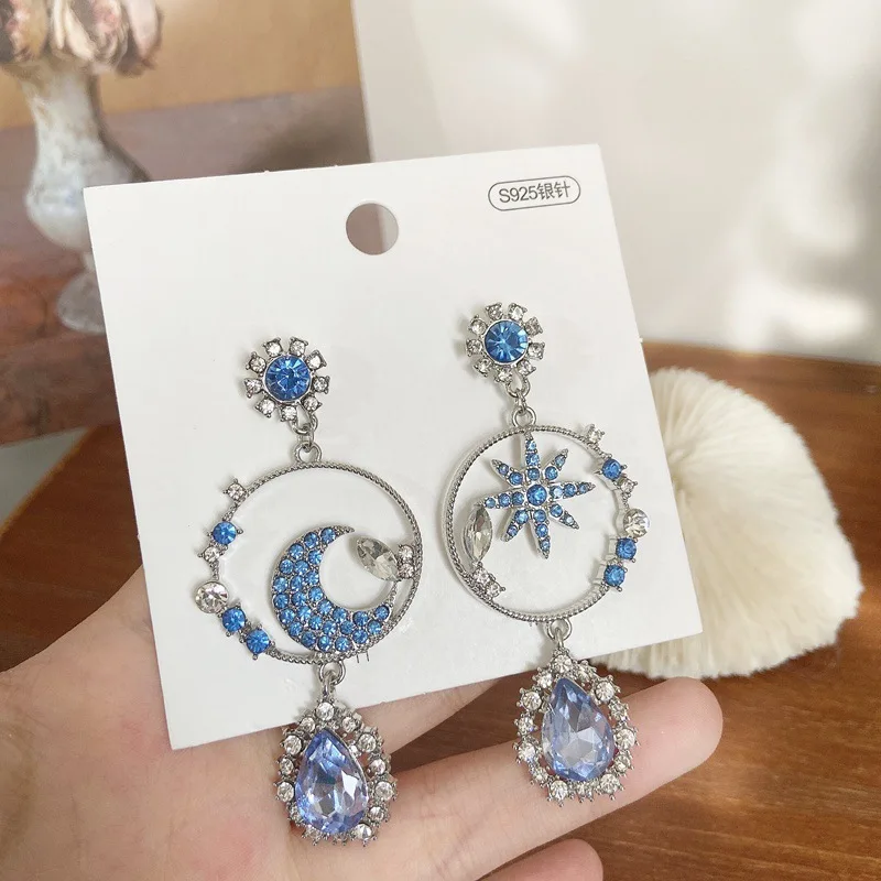 Trendy 2021 Jewelry Korean Elegant Star and Moon Asymmetry Blue Crystal Drop Earrings
Trendy 2021 Jewelry Korean Elegant Star and Moon Asymmetry Blue Crystal Drop Earrings