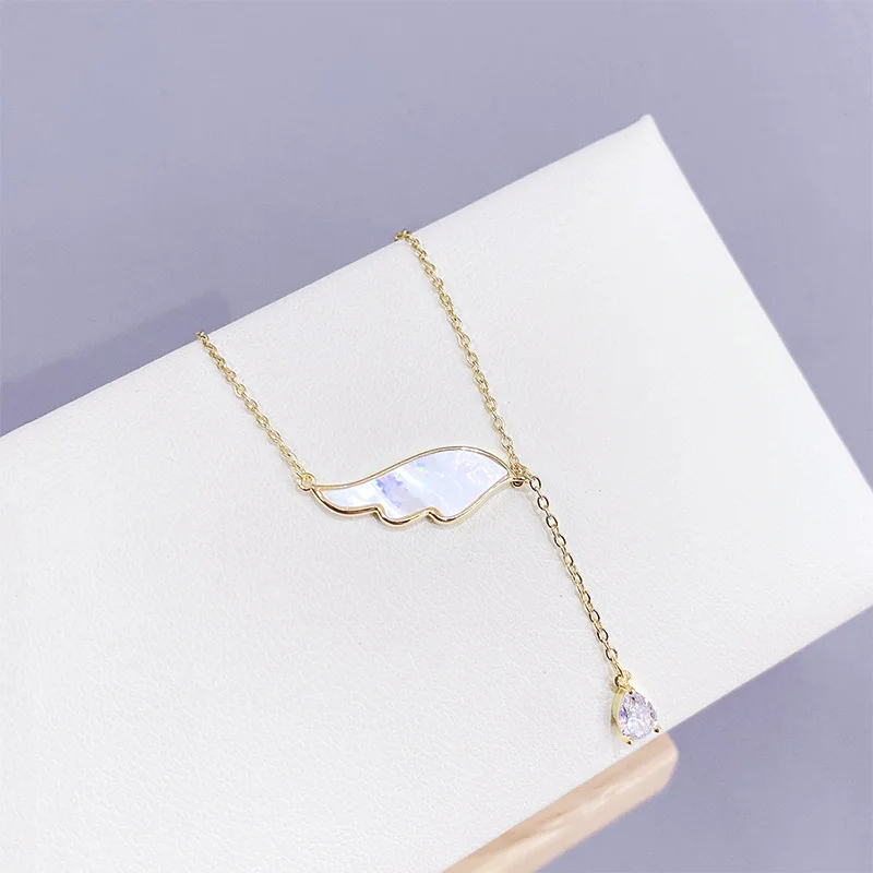 Delicate Angel Wing Shell Charm Necklace With Zircon Tassel Chain Pendant Necklace Wholesale
Delicate Angel Wing Shell Charm Necklace With Zircon Tassel Chain Pendant Necklace Wholesale