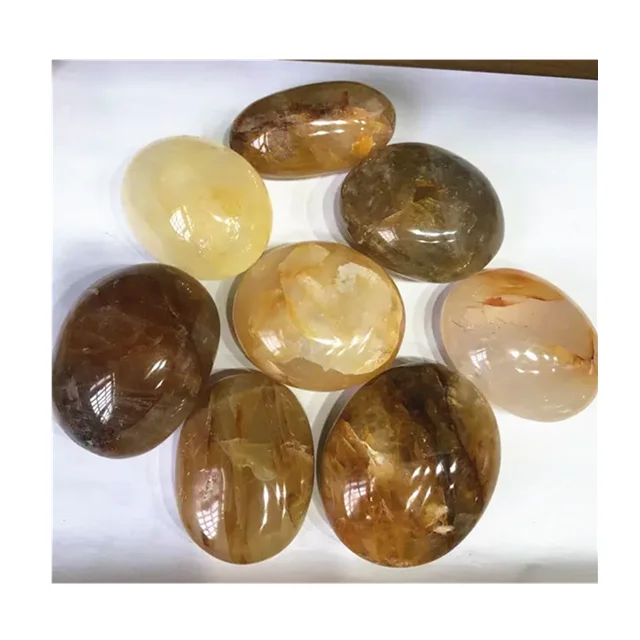 

Wholesale crystals healing massage stones natural green fluorite palm stones golden healer palm stone