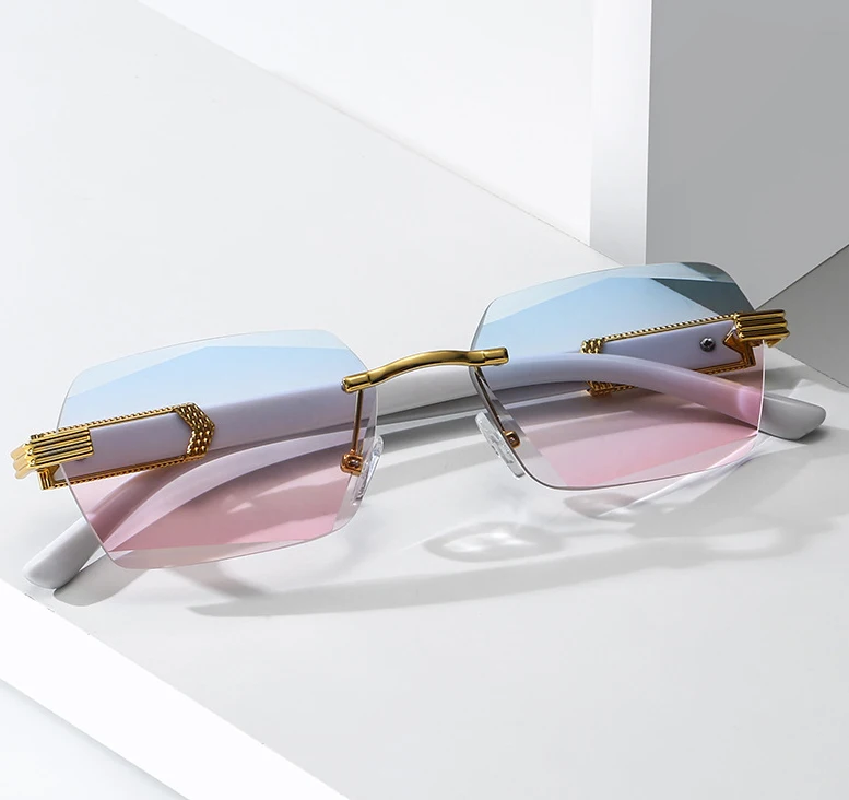 Hot selling designer fashion metal logo small square trendy luxury rimless sunglasses women 2022
Hot selling designer fashion metal logo small square trendy luxury rimless sunglasses women 2022