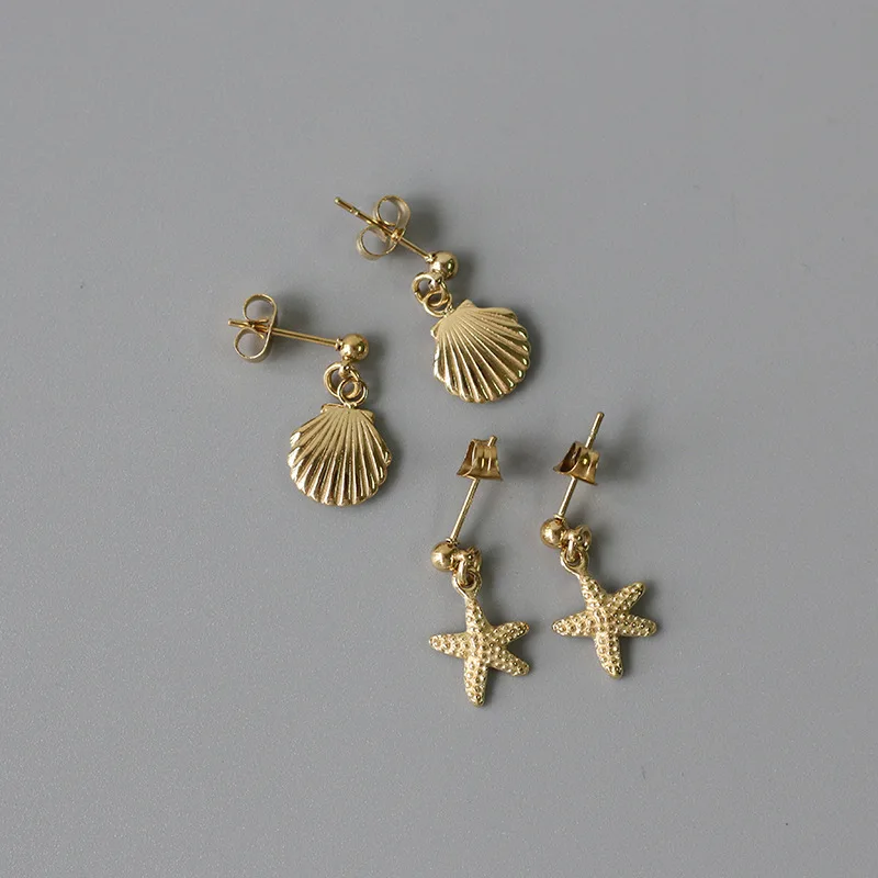 Woman Beach Pacific Sea Boho Starfish Fan Cowrie Shell Earrings Stainless Steel Asymmetry Starfish Pearl Shell Drop Earring
Woman Beach Pacific Sea Boho Starfish Fan Cowrie Shell Earrings Stainless Steel Asymmetry Starfish Pearl Shell Drop Earring