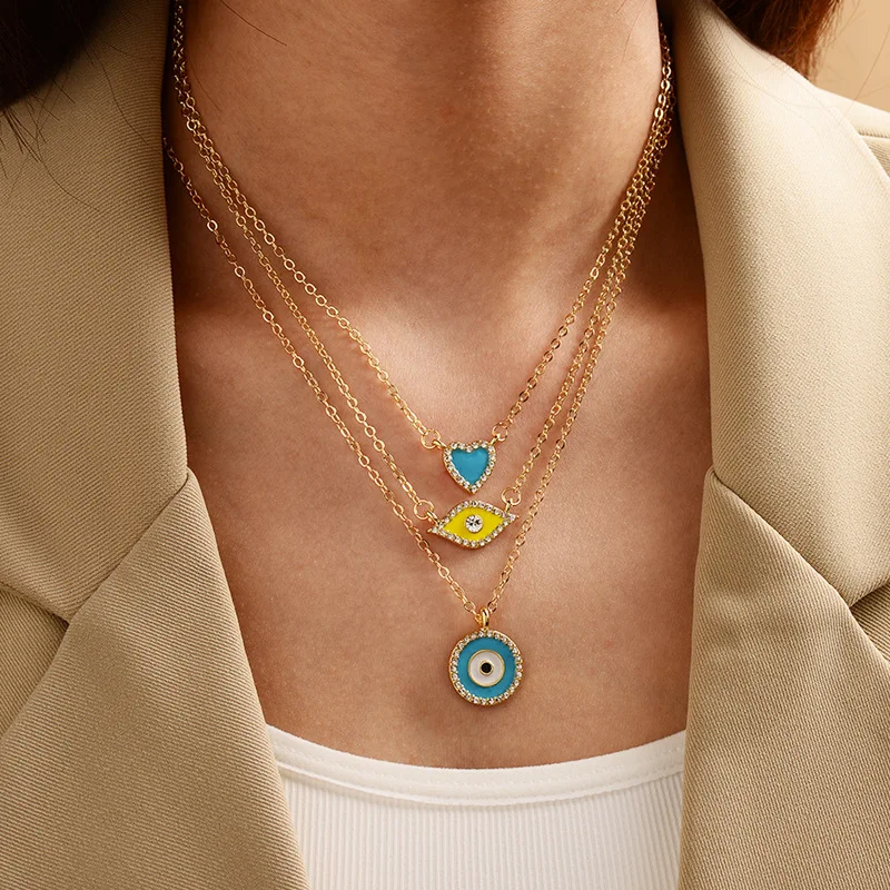 Fashion Jewelry Heart Round Turkish Evil Eyes Pendant Necklace Gold Color Long Chain Blue Eyes Necklace for Women
Fashion Jewelry Heart Round Turkish Evil Eyes Pendant Necklace Gold Color Long Chain Blue Eyes Necklace for Women