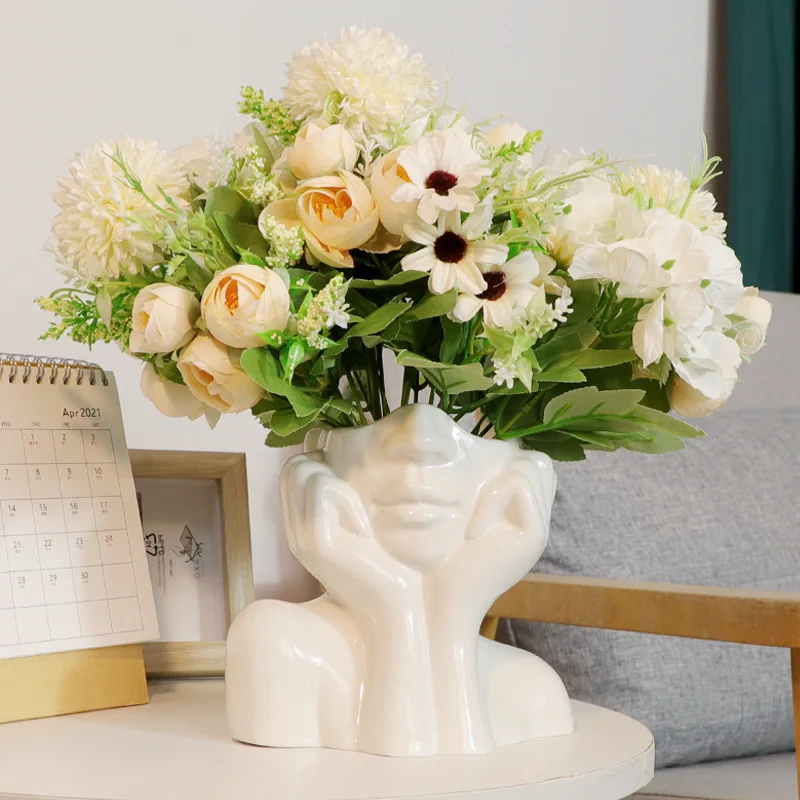Nordic home ceramic vase living room decoration handicraft ornaments simulation human body vase flower pot arrangement
Nordic home ceramic vase living room decoration handicraft ornaments simulation human body vase flower pot arrangement