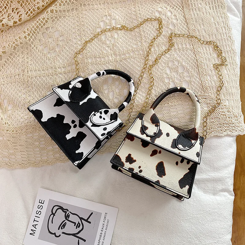 Fashionable mini handbag personalized printing cow pattern cute girl coin purse, Colors
Fashionable mini handbag personalized printing cow pattern cute girl coin purse, Colors