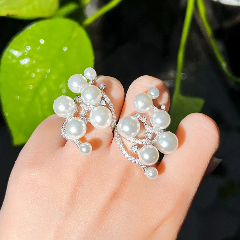 Adjustable Size Unique Creative Design Shiny White Cubic Zirconia Trendy Cute Engagement Moti Big Pearl Rings for Women Lady
Adjustable Size Unique Creative Design Shiny White Cubic Zirconia Trendy Cute Engagement Moti Big Pearl Rings for Women Lady