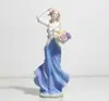 /product-detail/aphacatop-ceramic-holding-flowers-girl-statue-porcelain-figurine-62343989524.html
