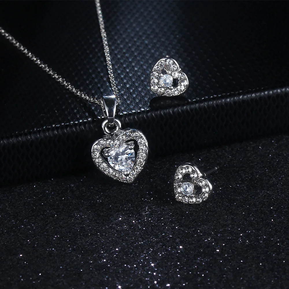 New Design Korean 2pcs/set Silver Plated Diamond Cz Necklace Earrings Crystal Cubic Zircon Heart Wedding Jewelry Set for Women
New Design Korean 2pcs/set Silver Plated Diamond Cz Necklace Earrings Crystal Cubic Zircon Heart Wedding Jewelry Set for Women