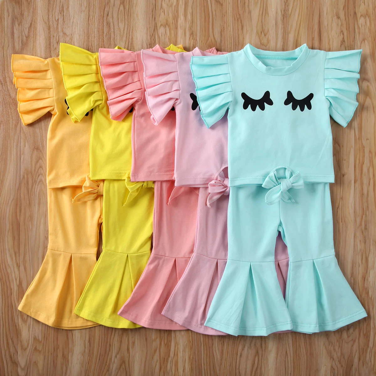 NEW Summer Cute Baby Girl Clothes Set Short Flying Sleeve T-Shirt + Flare Pants Candy colors Outfits 2Pcs Set
NEW Summer Cute Baby Girl Clothes Set Short Flying Sleeve T-Shirt + Flare Pants Candy colors Outfits 2Pcs Set