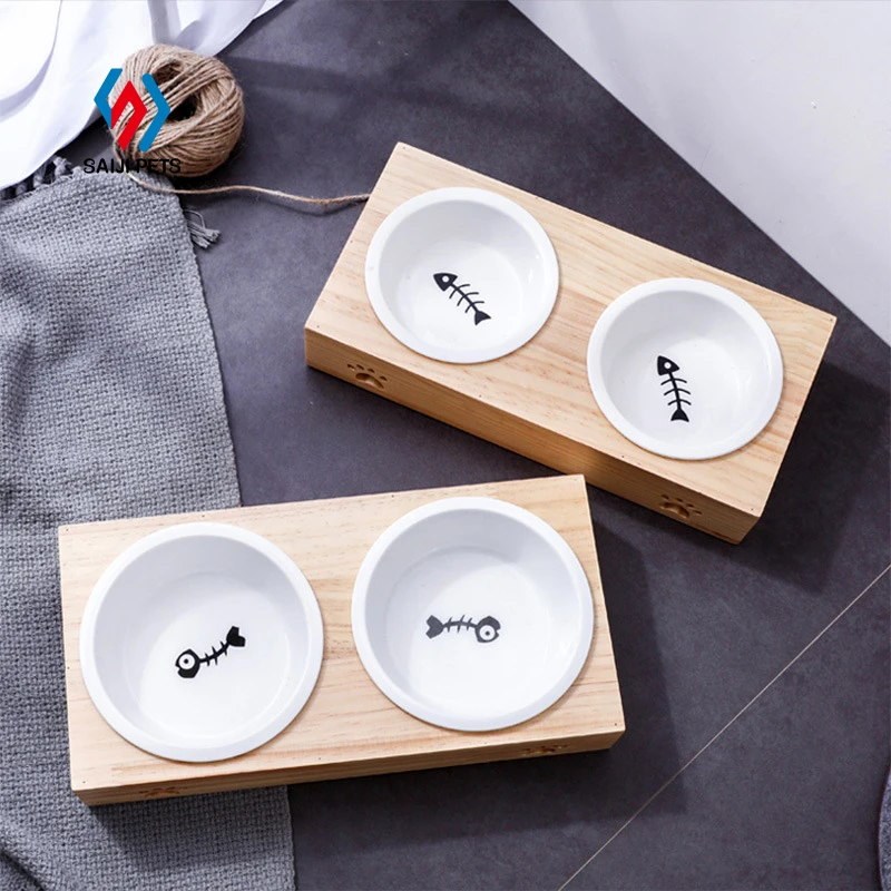 Saiji new arrival pet feeding fish bone embroidery stainless steel dual use ceramic elevated dog cat bowl with wood stand, Pink, grey, customized color
Saiji new arrival pet feeding fish bone embroidery stainless steel dual use ceramic elevated dog cat bowl with wood stand, Pink, grey, customized color