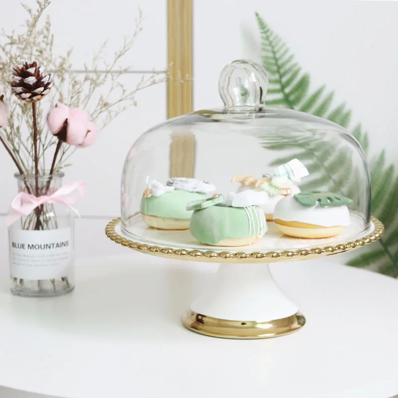 wholesale european style round luxury decorative gold wedding ceramic cake stand with glass cover
wholesale european style round luxury decorative gold wedding ceramic cake stand with glass cover