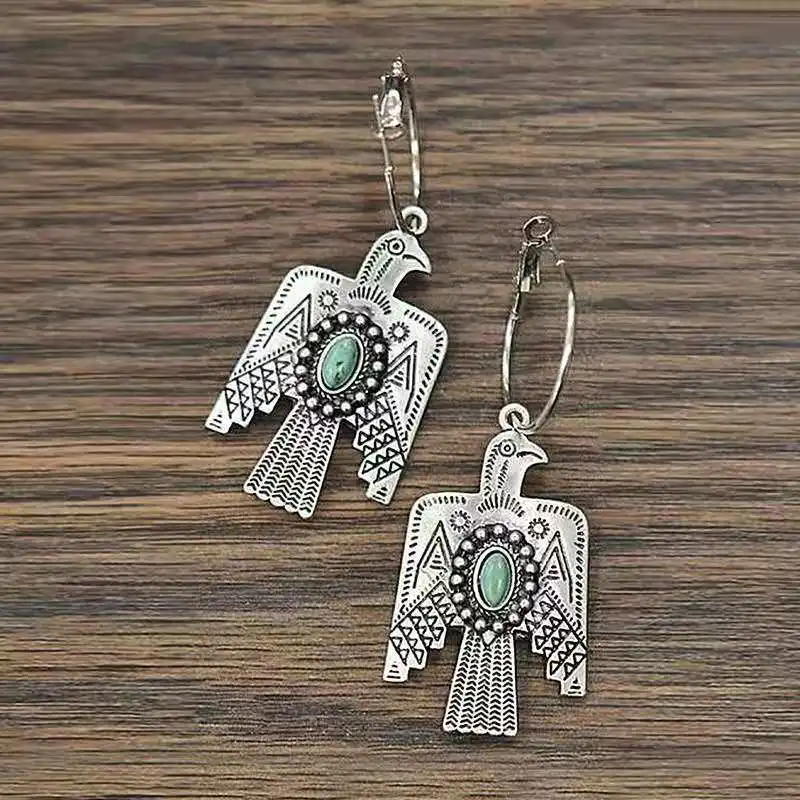 Personalized Retro Banquet Jewelry Green Moonstone Inlaid Ladies Jewelry Electroplated Eagle Earrings
Personalized Retro Banquet Jewelry Green Moonstone Inlaid Ladies Jewelry Electroplated Eagle Earrings
