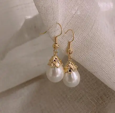 new 2019 contracted temperament pearl Drop earrings long Water Drop Modelling Classic style Women earrings Jewelry
new 2019 contracted temperament pearl Drop earrings long Water Drop Modelling Classic style Women earrings Jewelry