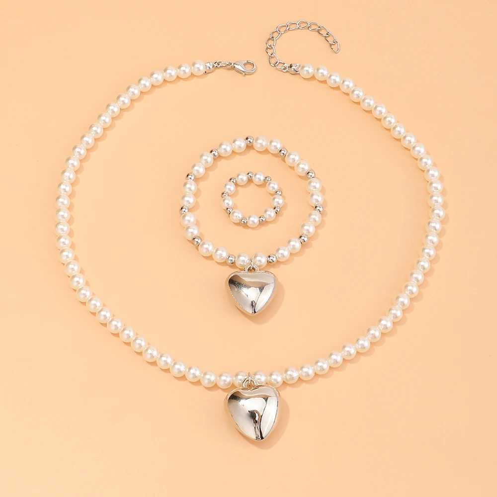 Wholesale New Heart Shaped Necklace Pearl Necklace Necklace Bracelet Ring Jewelry Set For Girls
Wholesale New Heart Shaped Necklace Pearl Necklace Necklace Bracelet Ring Jewelry Set For Girls