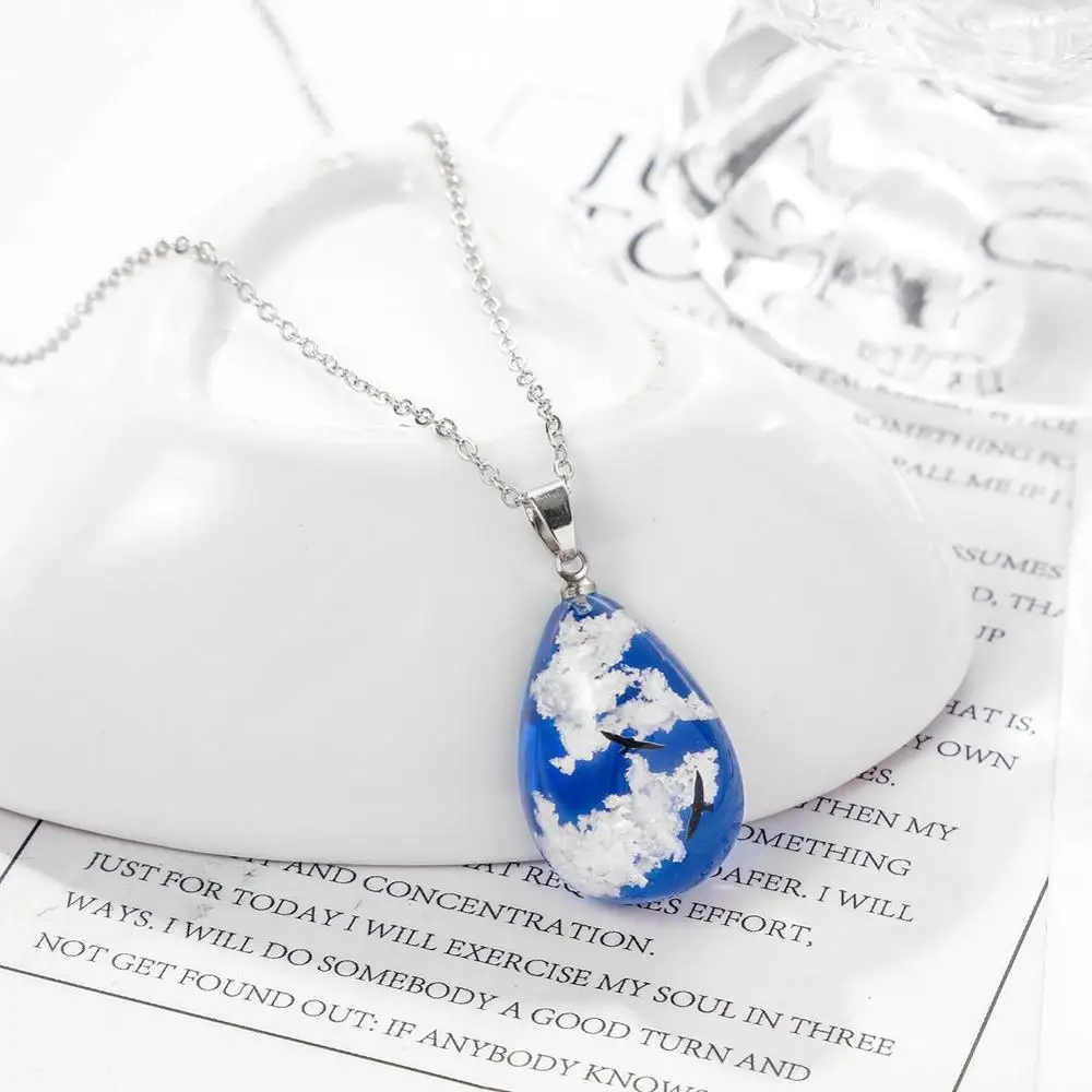 

Bohemia Style Blue Sky White Clouds Eagle Pattern Clear Resin Women Pendant Necklace Water Drop Shaped Lovers Necklace Jewelry, Picture