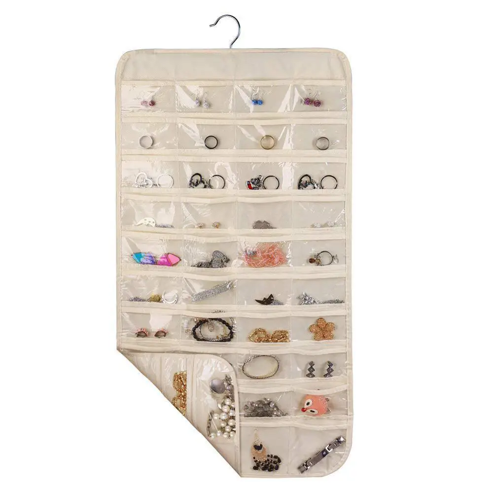 Hanging Cosmetic Bag Travel Kit And Jewelry Organizer For Holding Jewelries With Transparent PVC window
Hanging Cosmetic Bag Travel Kit And Jewelry Organizer For Holding Jewelries With Transparent PVC window