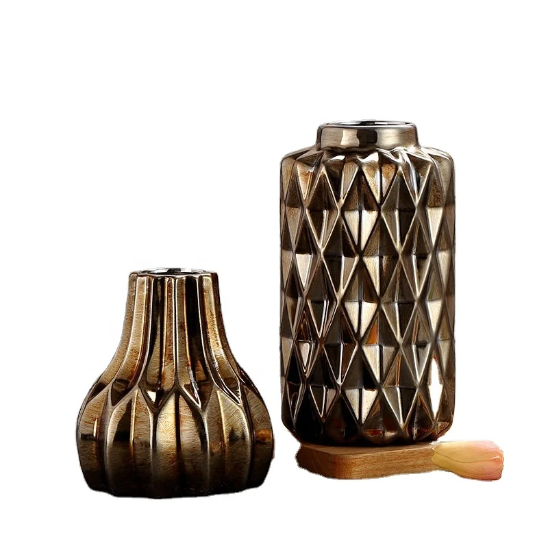 Creative factory directly sale indoor ceramic Vases flower vase with gold for hotel
Creative factory directly sale indoor ceramic Vases flower vase with gold for hotel