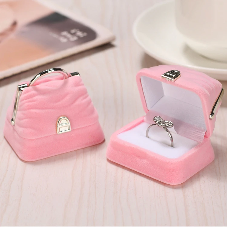 Funny Pink Velvet Jewelry Box Ring Earrings Storage Hand Bag Shape Baby Jewelry Box, Pink purple (customized)
Funny Pink Velvet Jewelry Box Ring Earrings Storage Hand Bag Shape Baby Jewelry Box, Pink purple (customized)