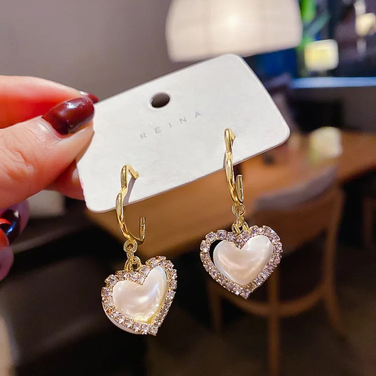 Fashion Trendy 925 Sterling Steel Needle Pearl Crystal Heart Drop Earring Pearl Crystal Heart Pendant Earring
Fashion Trendy 925 Sterling Steel Needle Pearl Crystal Heart Drop Earring Pearl Crystal Heart Pendant Earring