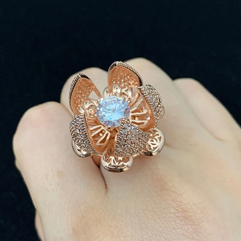 Silver plated gold plated rose gold plated micro pave cubic zirconia flower boom flower rotating ring
Silver plated gold plated rose gold plated micro pave cubic zirconia flower boom flower rotating ring