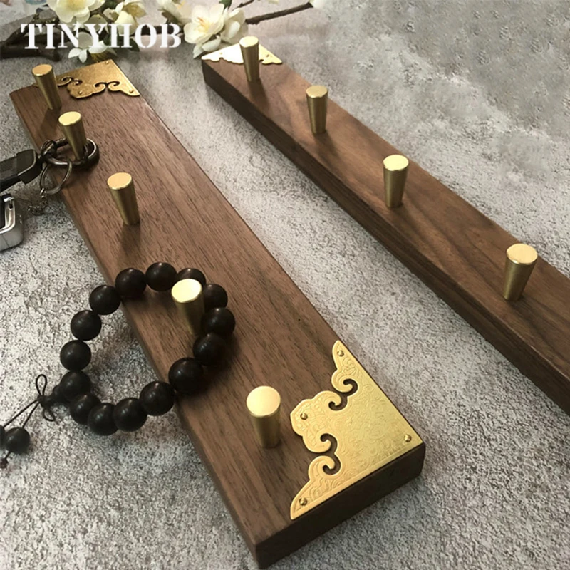 New Chinese style Japanese black walnut solid wood brass wall hanging key holder F-2182, As shown
New Chinese style Japanese black walnut solid wood brass wall hanging key holder F-2182, As shown