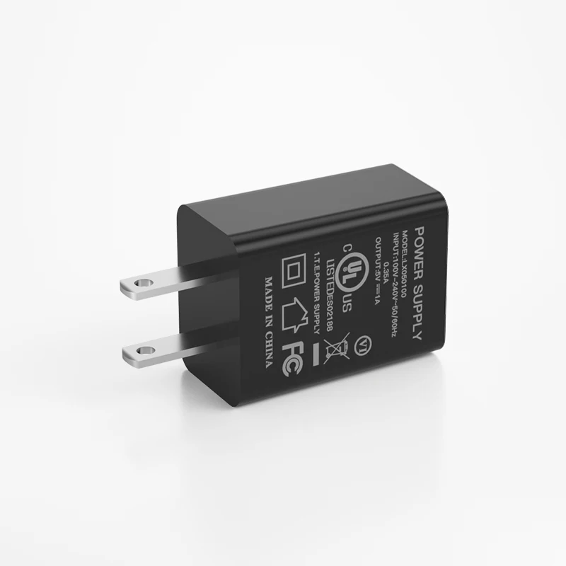 5V 2A USB AC/DC power adapter wall charger adaptor US plug DOE VI for mobile phones LX050200, White or black
5V 2A USB AC/DC power adapter wall charger adaptor US plug DOE VI for mobile phones LX050200, White or black