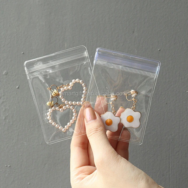 Small Size Transparent PVC Pouch Earring Bracelet Storage Bag Jewelry Zip lock Pouch With Custom LOGO
Small Size Transparent PVC Pouch Earring Bracelet Storage Bag Jewelry Zip lock Pouch With Custom LOGO