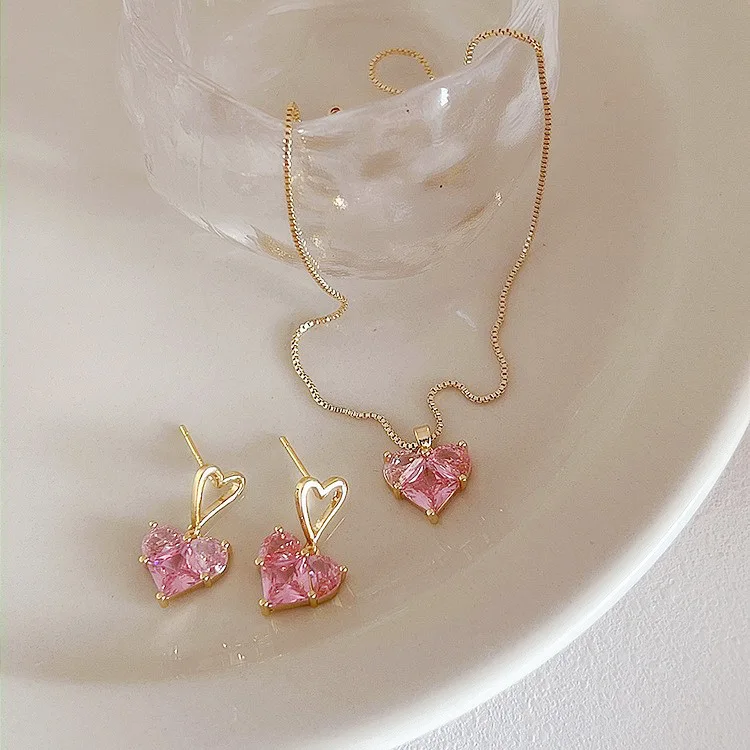 Korean 925 Silver Needle Designer Jewelry Sweet Bling Pink Zircon Love Heart Earrings Necklace Set For Women Girls
Korean 925 Silver Needle Designer Jewelry Sweet Bling Pink Zircon Love Heart Earrings Necklace Set For Women Girls