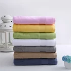 Guangzhou Factory Stock Custom Brand Towel 100% Cotton Spa And Hotel Bath Towel
