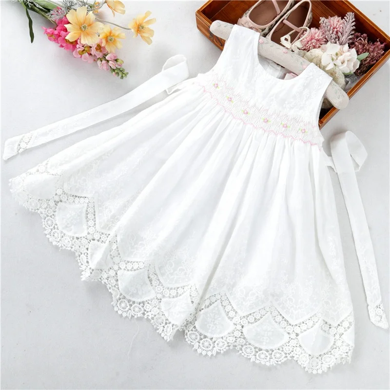B042863 white smocked dresses for girls hand made cotton kids clothes wholesale children clothing boutiques
B042863 white smocked dresses for girls hand made cotton kids clothes wholesale children clothing boutiques