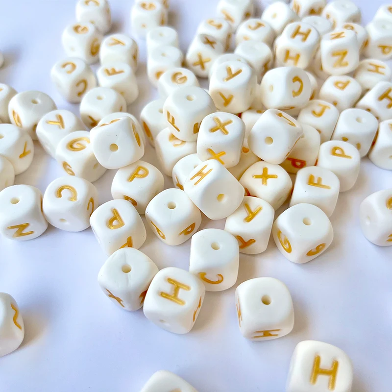 Factory Price Shape Letter Alphabet Beads Gold 12mm Soft Silicone Baby Teething English Letter Silicone Beads For Jewelry Making
Factory Price Shape Letter Alphabet Beads Gold 12mm Soft Silicone Baby Teething English Letter Silicone Beads For Jewelry Making