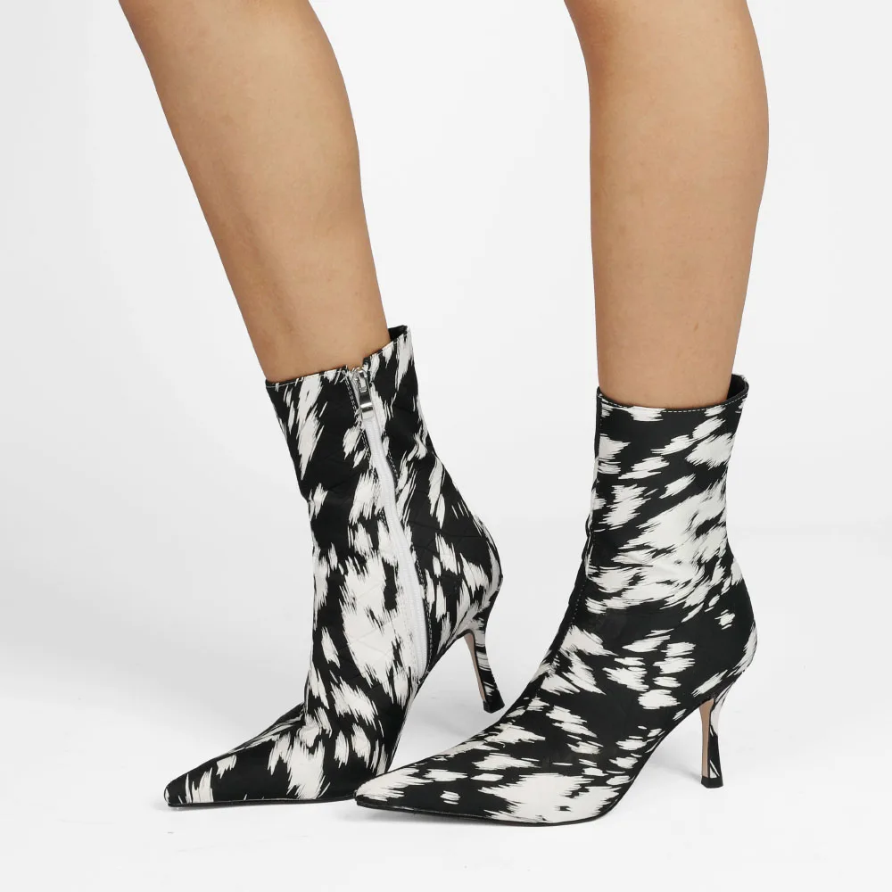 Self-designed European and American black and white pointed toe stiletto high heel women's ankle boots
Self-designed European and American black and white pointed toe stiletto high heel women's ankle boots