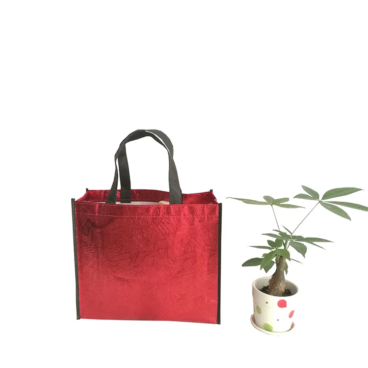 Red Shiny Metallic Laser Non Woven Bag for Clothing Store Shopping, Customized color
Red Shiny Metallic Laser Non Woven Bag for Clothing Store Shopping, Customized color