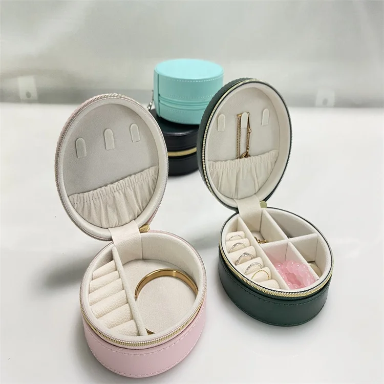 Custom Small Velvet Round Zipper Mini Travel Gift Ring Square Jewelry Box PU Leather Pink Box Jewelry
Custom Small Velvet Round Zipper Mini Travel Gift Ring Square Jewelry Box PU Leather Pink Box Jewelry