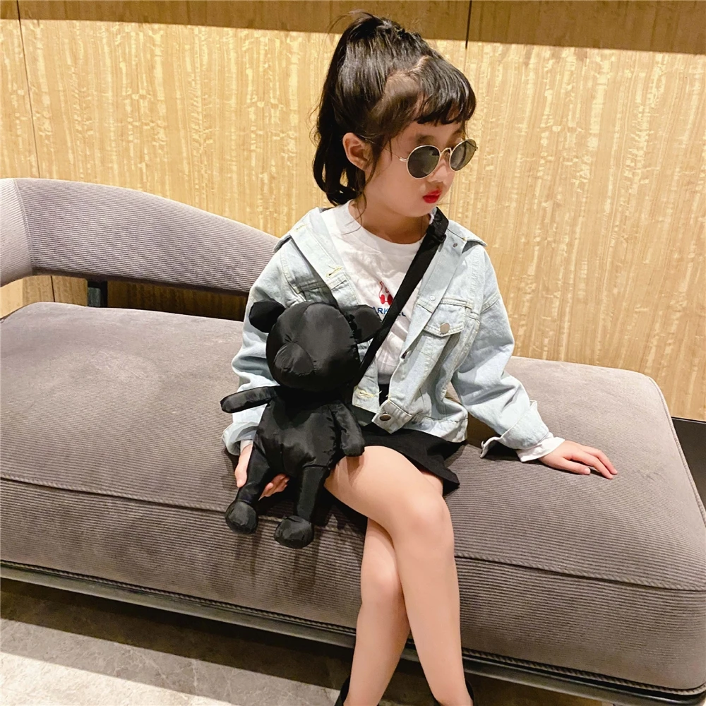 Ins South new of small black bear children, boys girls tide cool personality cross-body change decoration bag for men and women
Ins South new of small black bear children, boys girls tide cool personality cross-body change decoration bag for men and women