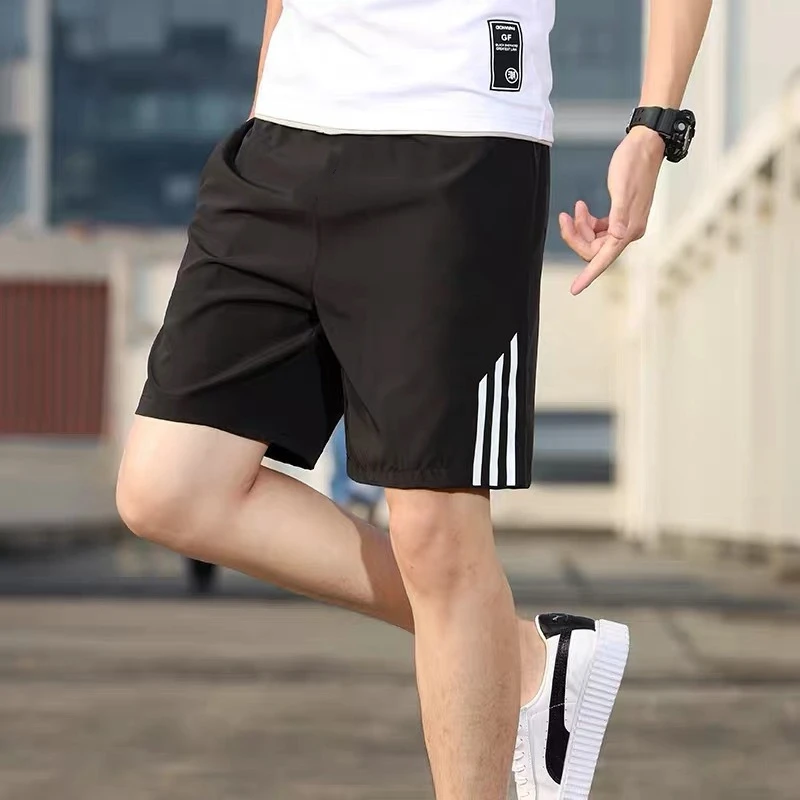 Sports shorts men's running fitness quick drying leisure five-point loose training ice silk plus size beach pants
Sports shorts men's running fitness quick drying leisure five-point loose training ice silk plus size beach pants