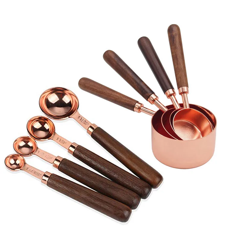 NEW High Quality 8 pcs Baking Rose Gold Measuring Spoons set Copper Measuring Cups set with wooden handle
NEW High Quality 8 pcs Baking Rose Gold Measuring Spoons set Copper Measuring Cups set with wooden handle