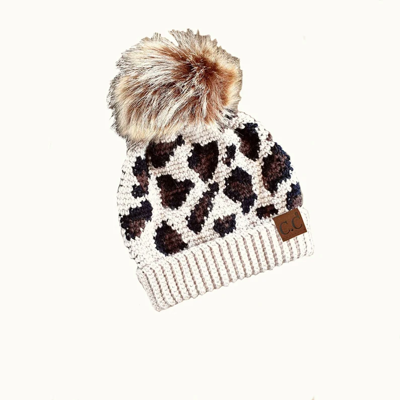 New Winter Trend Thermal Kids Pompom Beanies Leopard Knit Hats, 2 colors shown in the figure
New Winter Trend Thermal Kids Pompom Beanies Leopard Knit Hats, 2 colors shown in the figure