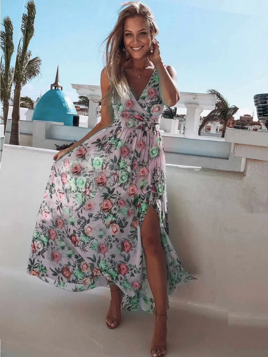 Summer European and American printed chiffon dress sleeveless holiday beach split long skirt
Summer European and American printed chiffon dress sleeveless holiday beach split long skirt