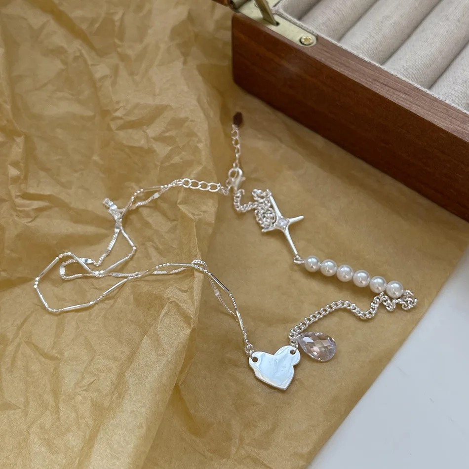 VIANRLA 925 sterling silver dedicate grass heart charm necklace with cross and pearl
VIANRLA 925 sterling silver dedicate grass heart charm necklace with cross and pearl