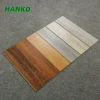 /product-detail/150x600-bedroom-wooden-finish-ceramic-flooring-tile-wood-look-strip-floor-porcelain-tiles-62412636287.html