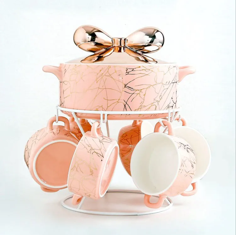 New arrival Nordic luxury gold bowtie 1pot 6cup with frame marbling ceramic soup bowl set lovely gift set
New arrival Nordic luxury gold bowtie 1pot 6cup with frame marbling ceramic soup bowl set lovely gift set