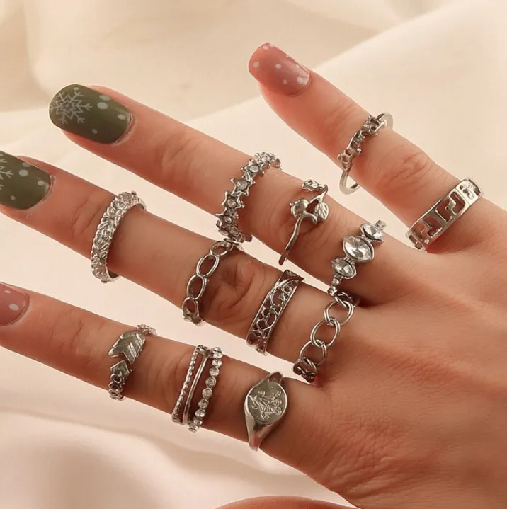 12pcs/sets Fashion hollow-out carved diamond ring with simple chain metal ring elements for women, Silver
12pcs/sets Fashion hollow-out carved diamond ring with simple chain metal ring elements for women, Silver