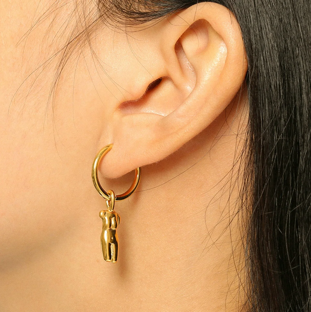 Canadian designer Abstract steric body pendant Earrings 18K Gold Plated 316L Stainless Steel Huggie Earrings
Canadian designer Abstract steric body pendant Earrings 18K Gold Plated 316L Stainless Steel Huggie Earrings
